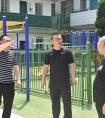 安居区教体局副局长吕强胜一行来到莲花初中视察指导工作