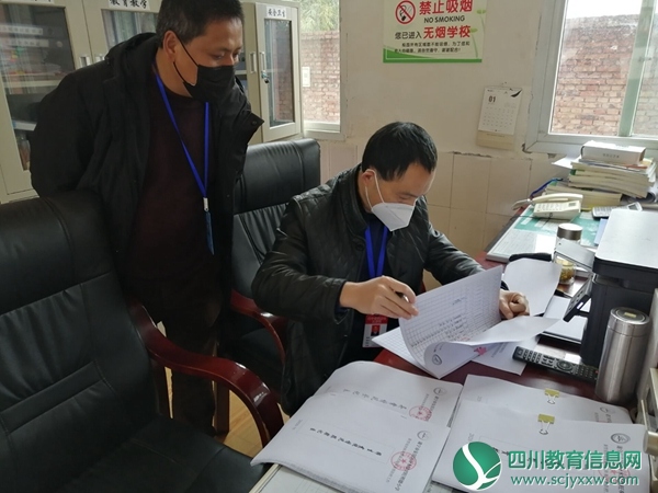 安居区计财股副股长唐纪春深入兴旺明德小学督查督导 新型肺炎疫情防控工作